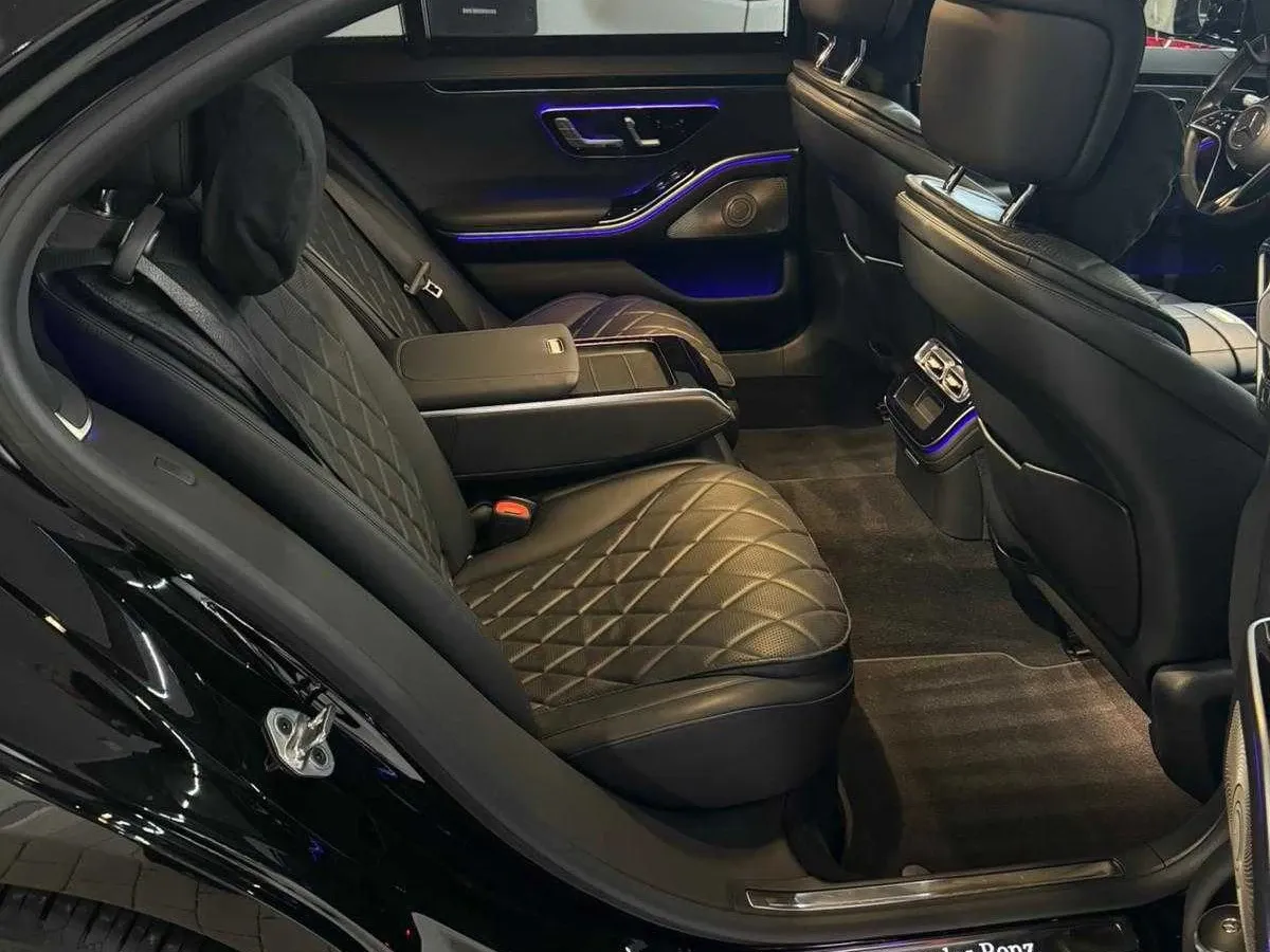 The black Mercedes-Benz S-Class, shot 2