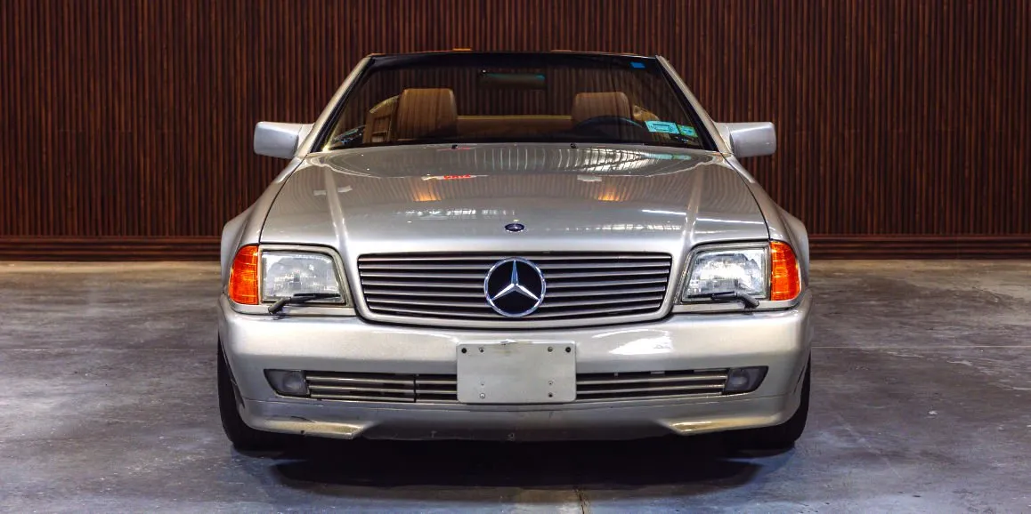 Silver Mercedes-Benz SL500 exterior with convertible roof for wedding car rental