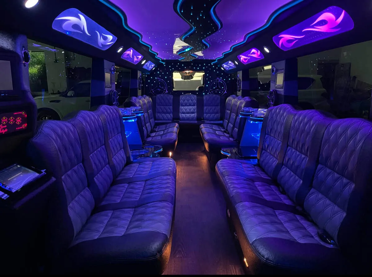 Mercedes-Benz G Wagon interior with perimeter lounge seating, LED accent lighting and LED ceiling lighting for limo rental
