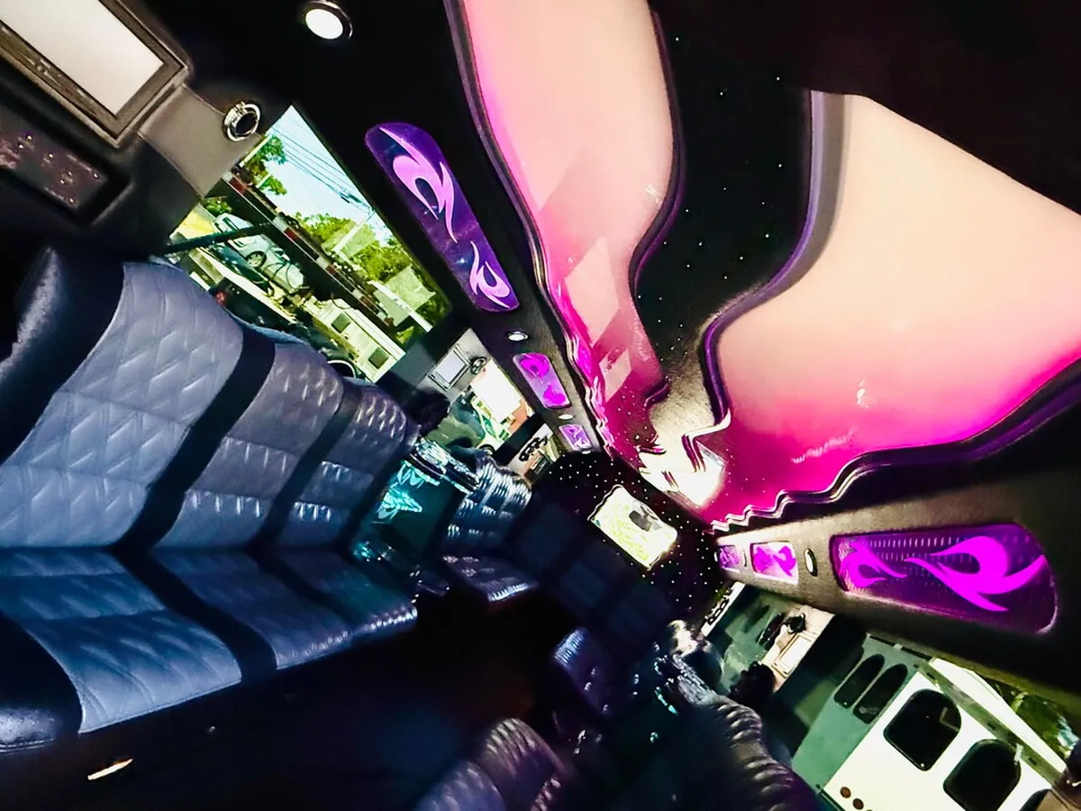 Mercedes-Benz G Wagon interior with perimeter lounge seating, LED ceiling lighting and starlight or fiber-optic ceiling, photo 10 for limo rental