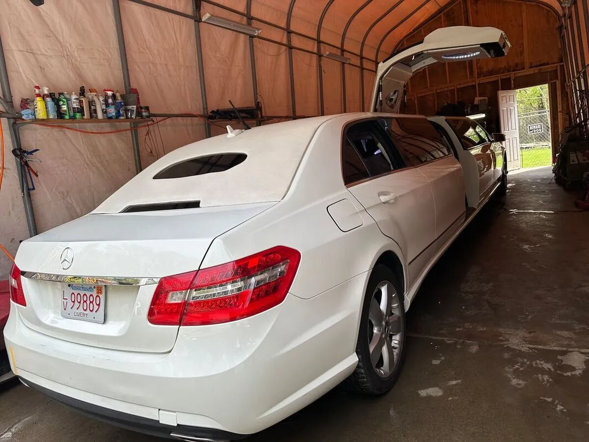 White Mercedes-Benz Jet Doors Limousine exterior with bridal (jet) door for limo rental