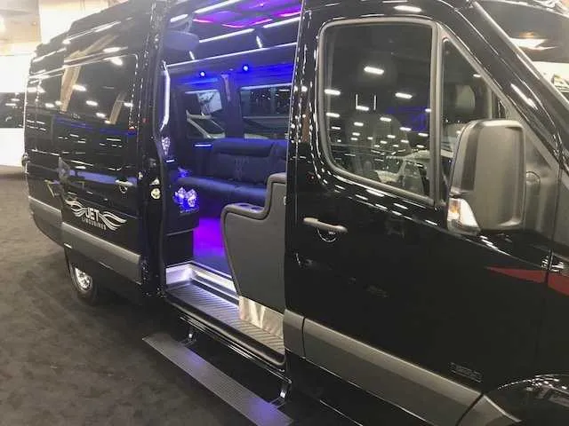 Black Mercedes-Benz Party Bus exterior for party bus rental in Mather, CA