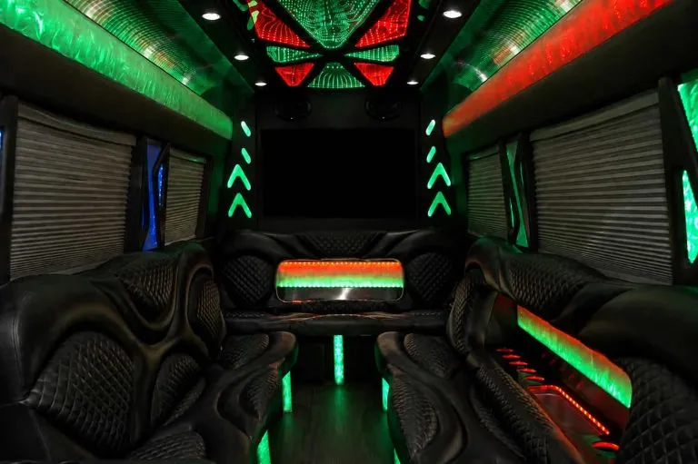 Mercedes-Benz Sprinter Limousine interior with perimeter lounge seating, window shades and LED accent lighting, photo 2 for party bus rental in El Paso, TX