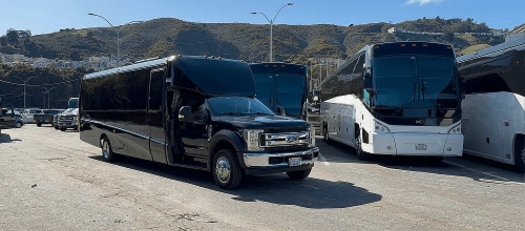 Black 20 Passenger Minibus with tinted windows for charter bus rental in South San Francisco, CA