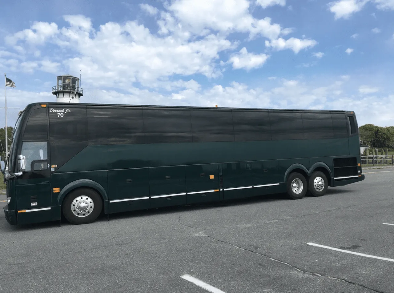56 Passenger Motor Coach with tinted windows for charter bus rental