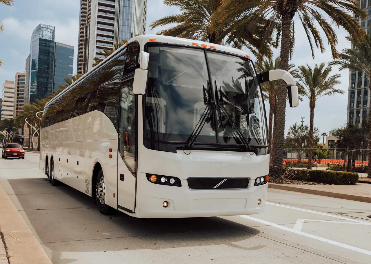 White 56 Passenger Motor Coach for charter bus rental in Hacienda Heights, CA