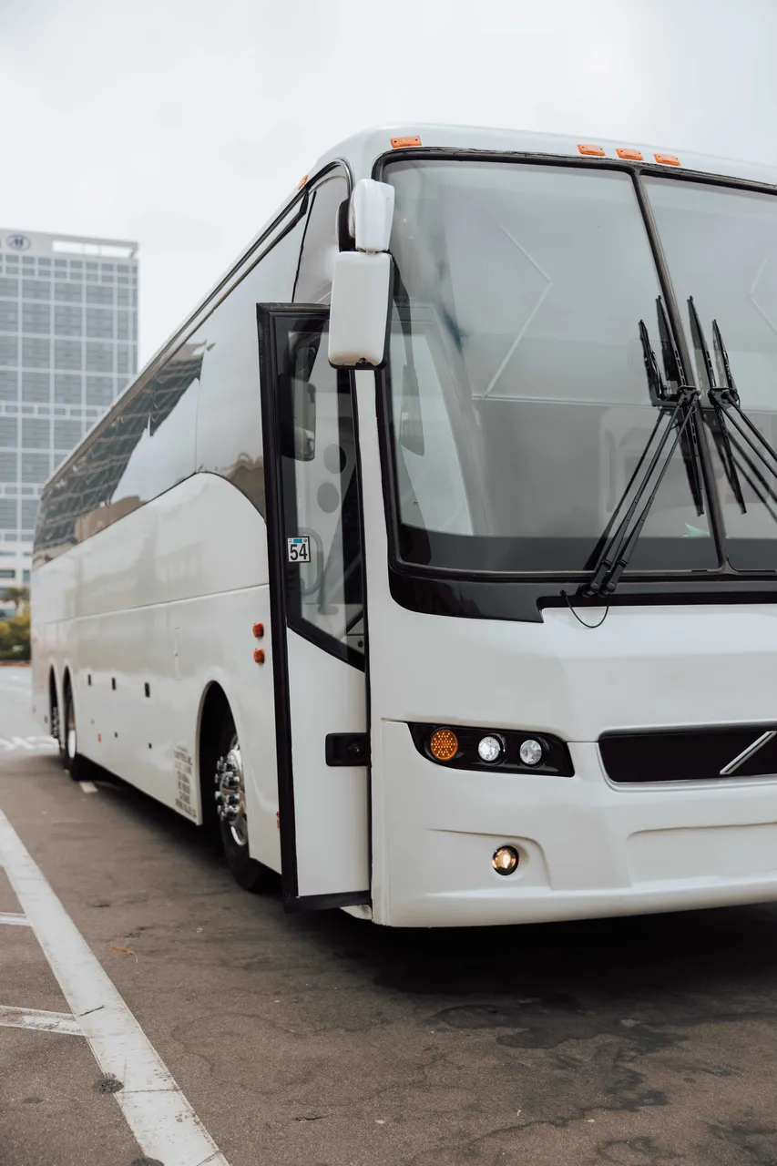 White 56 Passenger Motor Coach exterior, photo 3 for charter bus rental in Hacienda Heights, CA