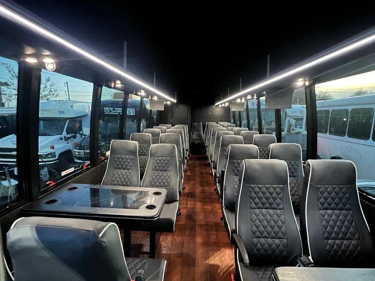 The black 40 Passenger Motorcoach, shot 3