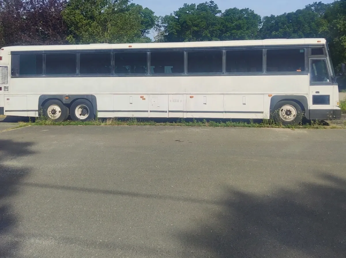 The white Motorcoach MCI, shot 2