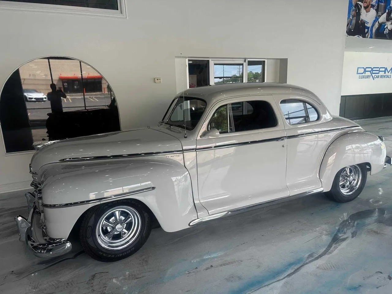Silver Plymouth Classic for wedding car rental