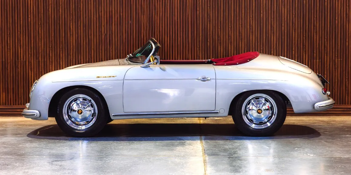 Silver Porsche Speedster 1956 (Vintage) with convertible roof for sports car rental