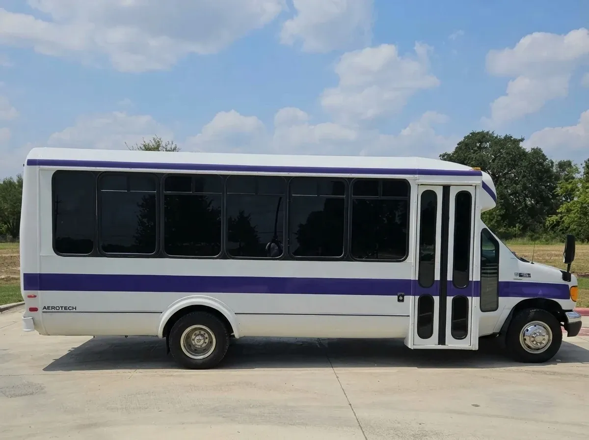 The white Purpleline Party Bus, shot 3