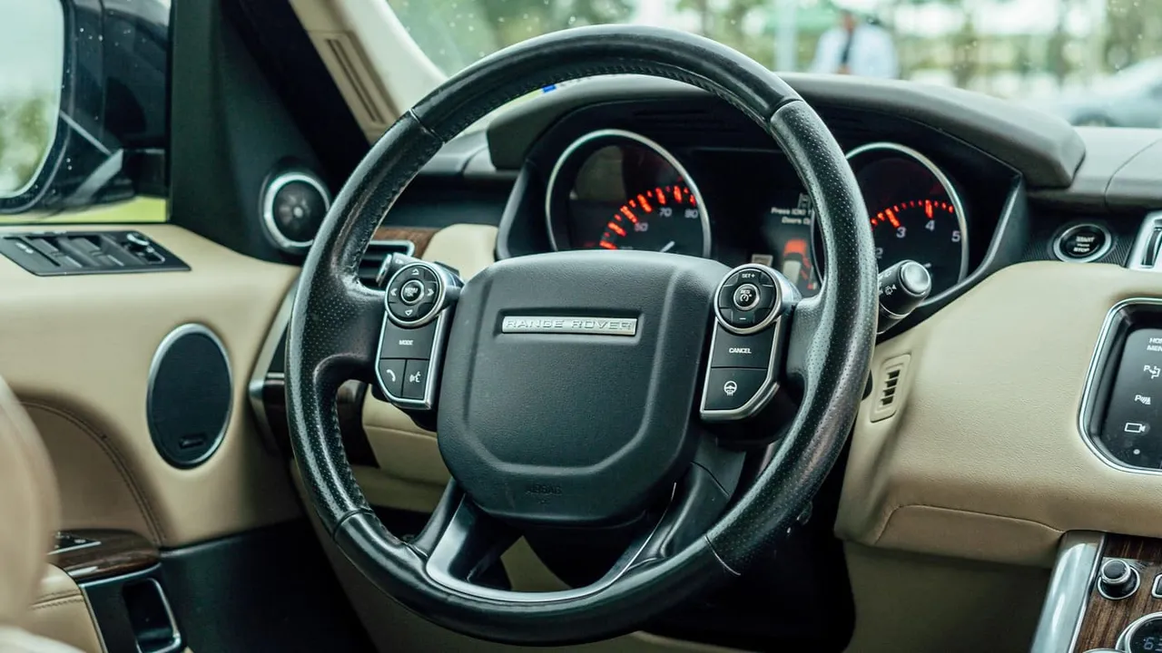 The black Range Rover Sport, shot 2
