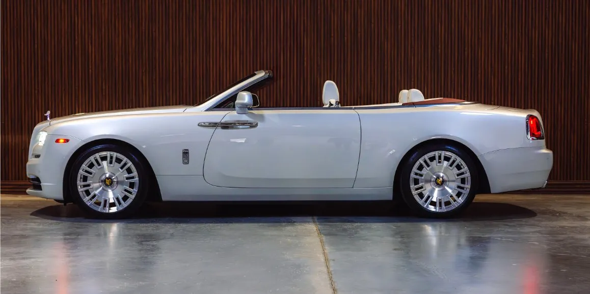 White Rolls-Royce Dawn exterior with convertible roof for wedding car rental