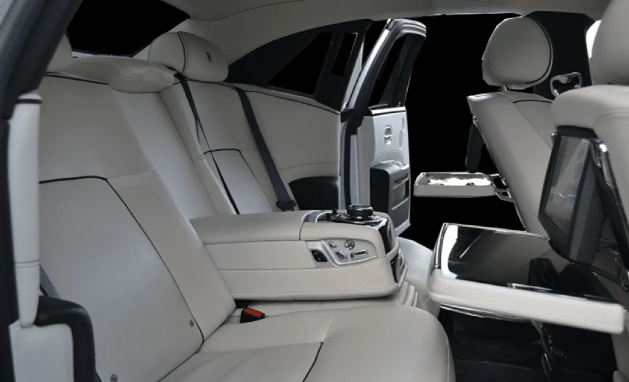 Rolls-Royce Ghost interior with rear-seat entertainment screens for wedding car rental