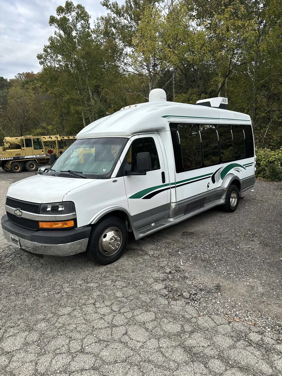 White Small Party Bus exterior with tinted windows for party bus rental in Pittsburgh, PA