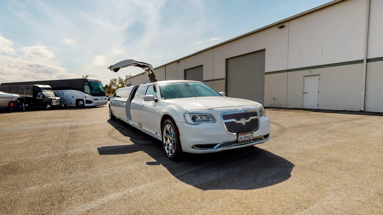 White Chrysler 300 Stretch Limousine, photo 2 for party bus rental in Keyes, CA